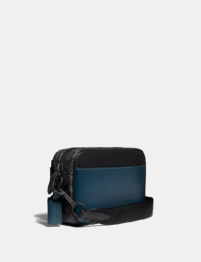 Shop Coach Academy Crossbody With Signature Canvas Blocking In Color<lsn_delimiter>black Copper/midnight Navy/charcoal