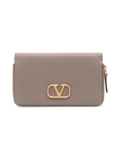 Shop Valentino Garavani Vlogo Leather Smartphone Case In Clay