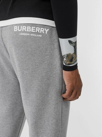 Shop Burberry Logo Print Cotton Trackpants In Pale Grey Melange
