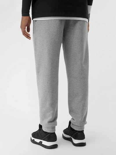 Shop Burberry Logo Print Cotton Trackpants In Pale Grey Melange