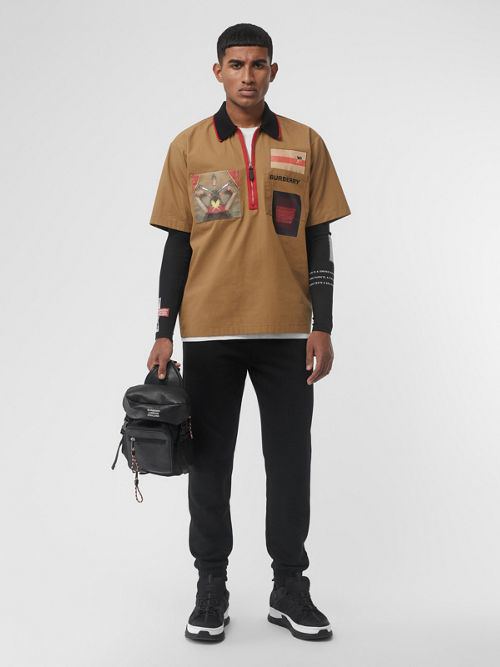 in the back with the burberry on