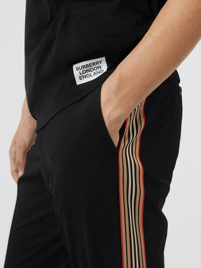 Shop Burberry Slim Fit Icon Stripe Detail Cotton Chinos In Black