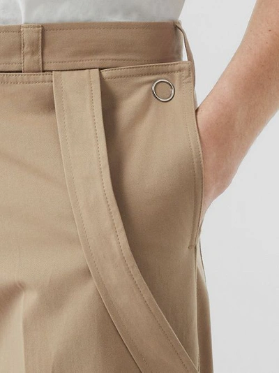 Shop Burberry Strap Detail Cotton Trousers In Desert