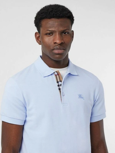 Shop Burberry Check Placket Cotton Polo Shirt In Baby Blue
