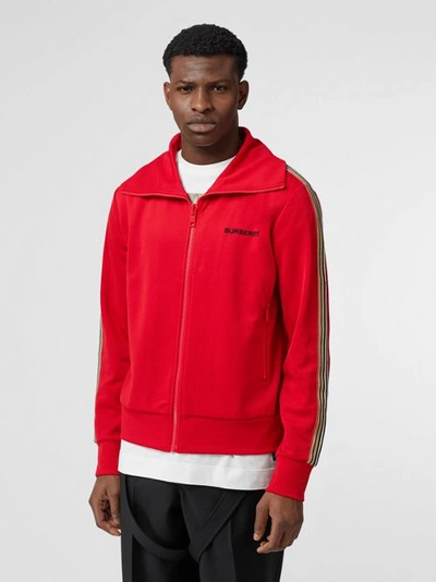 Shop Burberry Icon Stripe Detail Funnel Neck Track Top In Bright Red