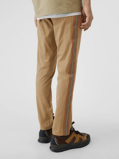 Shop Burberry Slim Fit Icon Stripe Detail Cotton Chinos In Honey