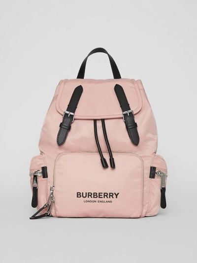 Shop Burberry The Medium Rucksack In Logo Print Nylon In Rose Beige