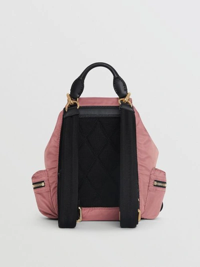 Shop Burberry The Small Crossbody Rucksack In Nylon In Mauve Pink