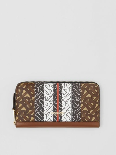 Shop Burberry Monogram Stripe E-canvas And Leather Ziparound Wallet In Bridle Brown