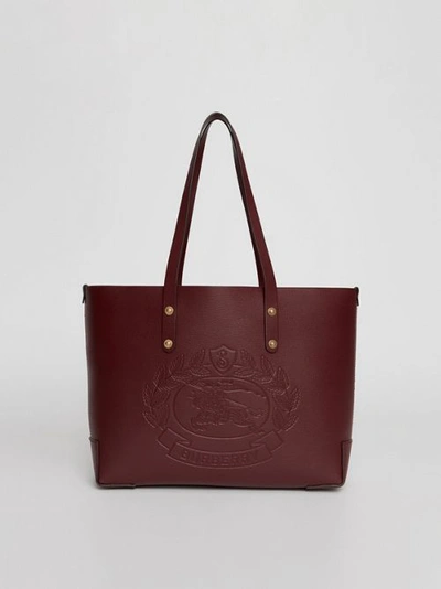 Shop Burberry Small Embossed Crest Leather Tote In Burgundy