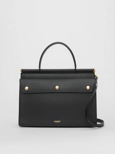 Shop Burberry Small Leather Title Bag With Pocket Detail In Black