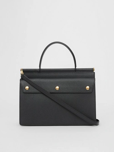 Shop Burberry Small Leather Title Bag With Pocket Detail In Black
