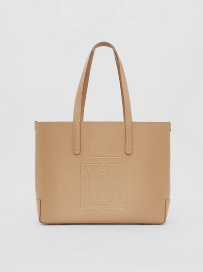 Shop Burberry Embossed Monogram Motif Leather Tote In Camel