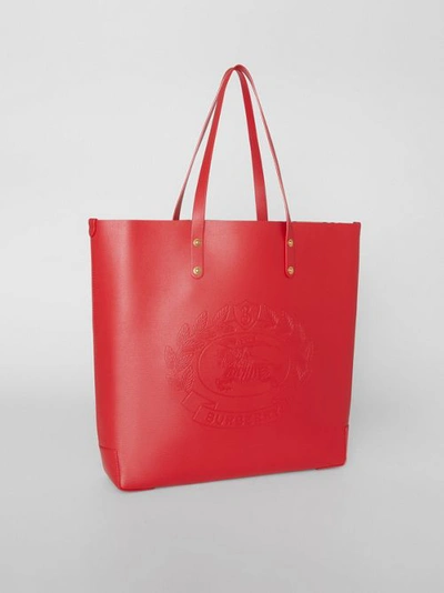 Shop Burberry Large Embossed Crest Leather Tote In Rust Red