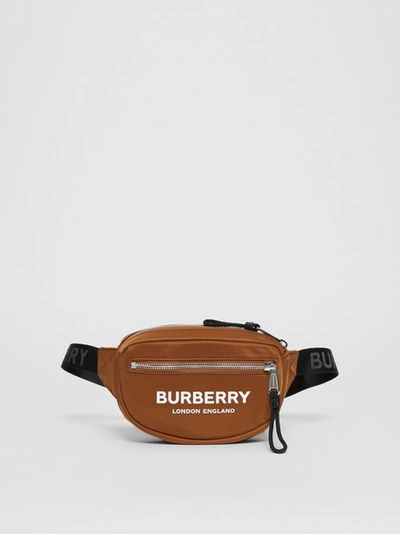 Shop Burberry Small Logo Print Cannon Bum Bag In Dark Camel