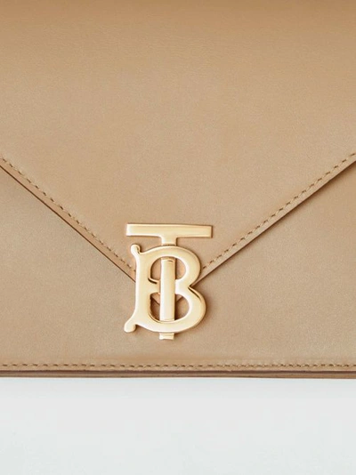 Shop Burberry Small Leather Tb Envelope Clutch In Honey