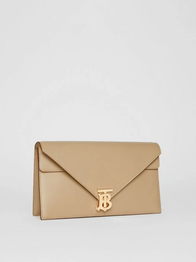 Shop Burberry Small Leather Tb Envelope Clutch In Honey