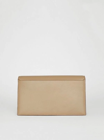 Shop Burberry Small Leather Tb Envelope Clutch In Honey
