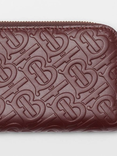 Shop Burberry Monogram Leather Ziparound Wallet In Oxblood