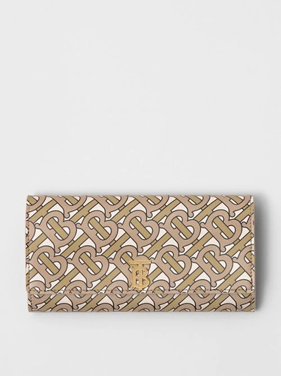Shop Burberry Monogram Print Leather Continental Wallet In Beige