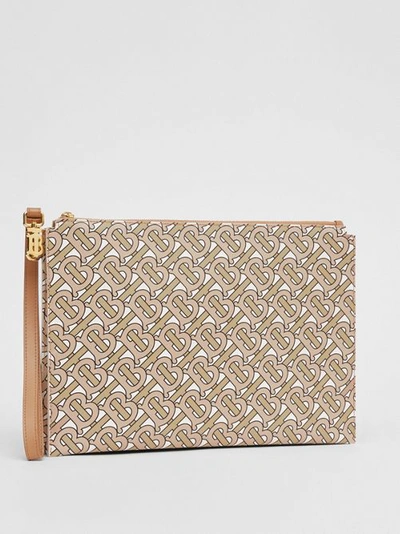 Shop Burberry Monogram Print Leather Pouch In Beige