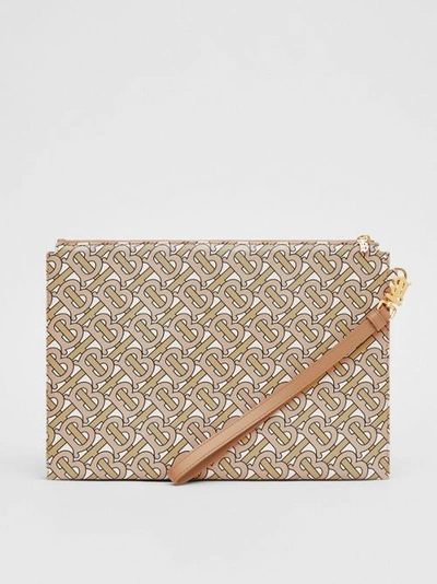 Shop Burberry Monogram Print Leather Pouch In Beige