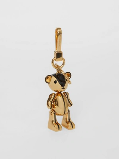 Shop Burberry Gold-plated Thomas Bear Charm In Black/light Gold