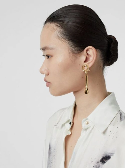Shop Burberry Gold-plated Hoof Drop Earrings In Light Gold
