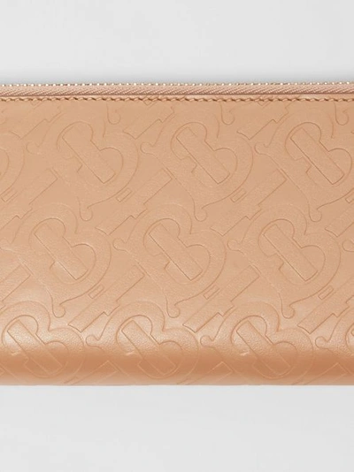 Shop Burberry Monogram Leather Ziparound Wallet In Light Camel