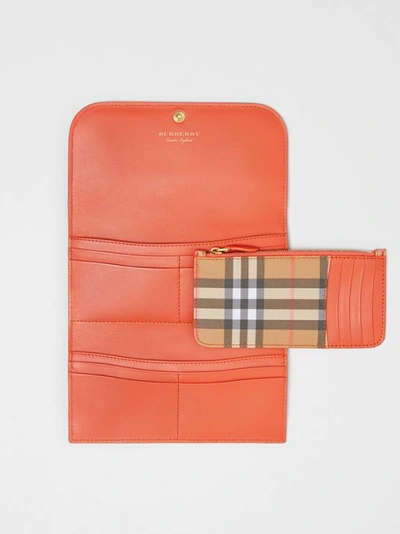 Shop Burberry Vintage Check Continental Wallet With Zip Card Case In Clementine