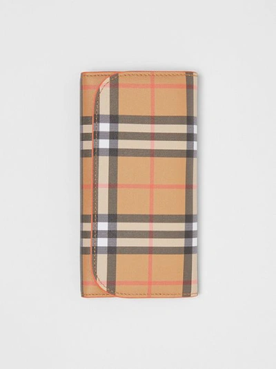 Shop Burberry Vintage Check Continental Wallet With Zip Card Case In Clementine