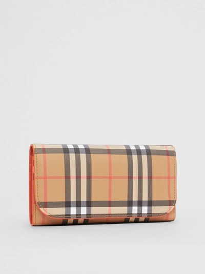 Shop Burberry Vintage Check Continental Wallet With Zip Card Case In Clementine