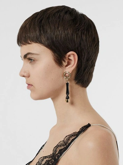 Shop Burberry Resin And Gold-plated Hoof Drop Earrings In Black/light Gold