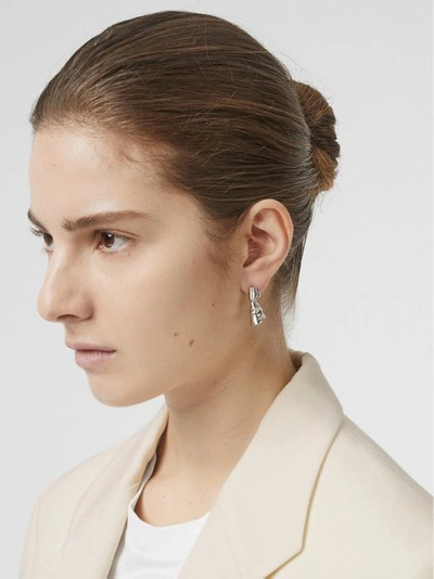 Shop Burberry Palladium-plated Hoof Earrings