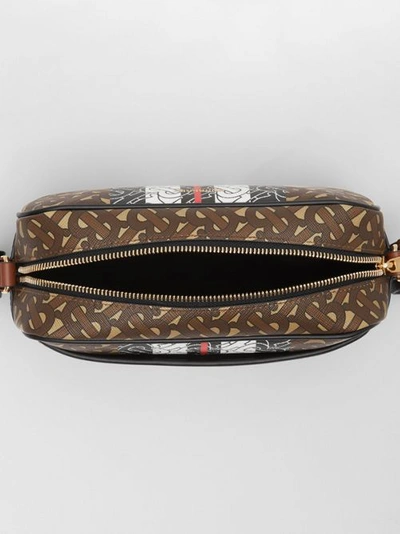 Shop Burberry Monogram Stripe E-canvas Crossbody Bag In Bridle Brown