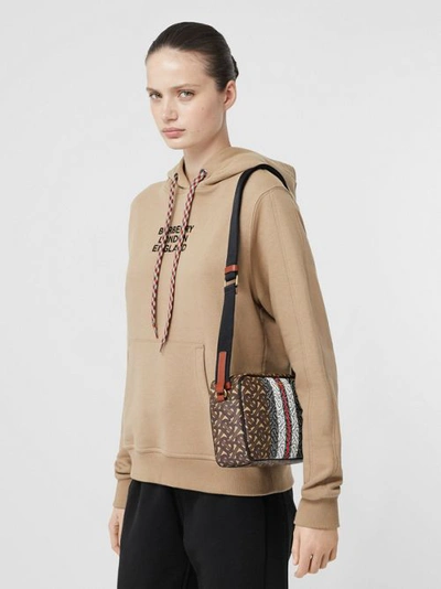 Shop Burberry Monogram Stripe E-canvas Crossbody Bag In Bridle Brown