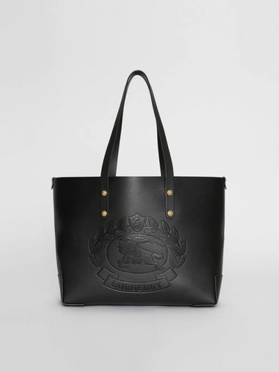 Shop Burberry Small Embossed Crest Leather Tote In Black