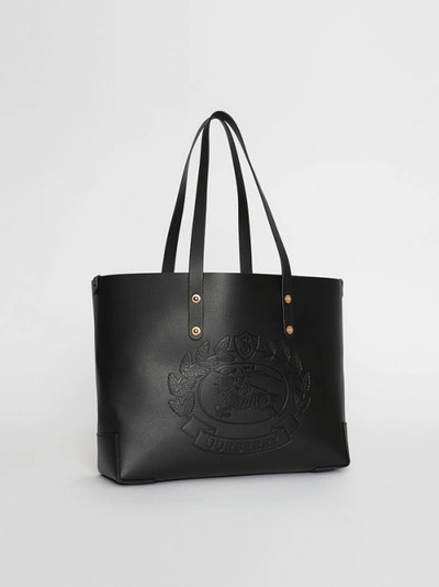 Shop Burberry Small Embossed Crest Leather Tote In Black