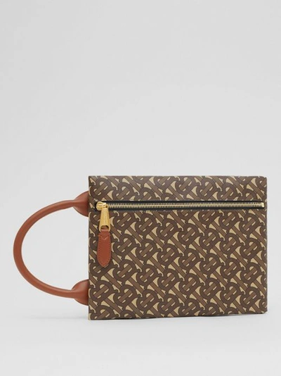 Shop Burberry Monogram Print E-canvas Portrait Pouch In Bridle Brown