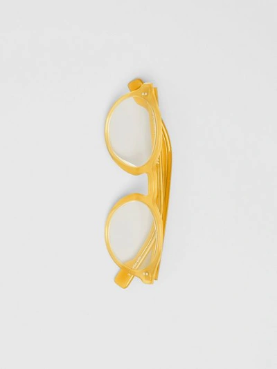 Shop Burberry Keyhole Round Optical Frames In Ochre Yellow