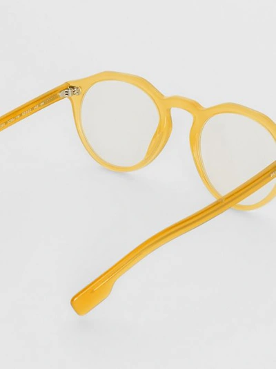 Shop Burberry Keyhole Round Optical Frames In Ochre Yellow