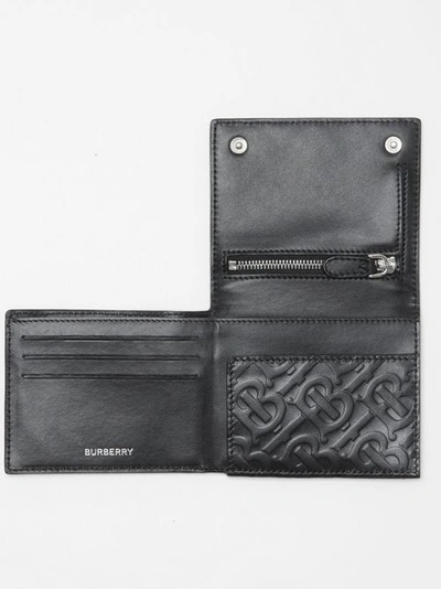 Shop Burberry Monogram Embossed Leather Trifold Wallet In Black