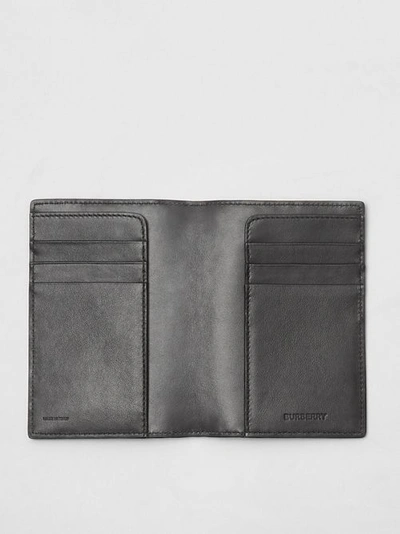 Shop Burberry Monogram Leather Passport Holder In Black