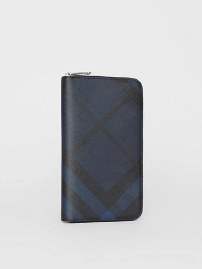 Shop Burberry London Check And Leather Ziparound Wallet In Navy/black