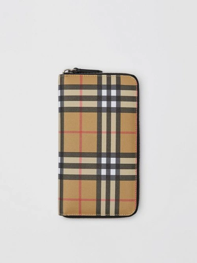 Shop Burberry Vintage Check And Leather Ziparound Wallet In Antique Yellow/black
