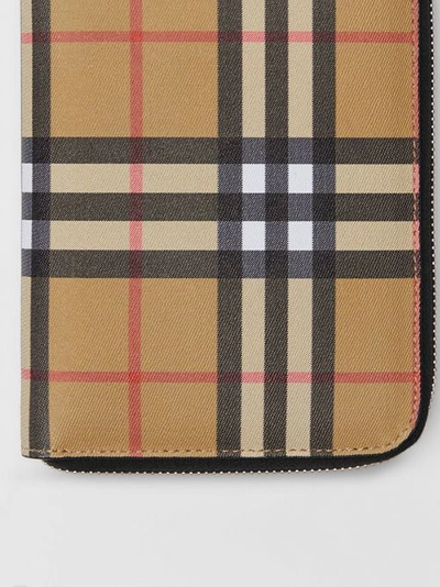 Shop Burberry Vintage Check And Leather Ziparound Wallet In Antique Yellow/black