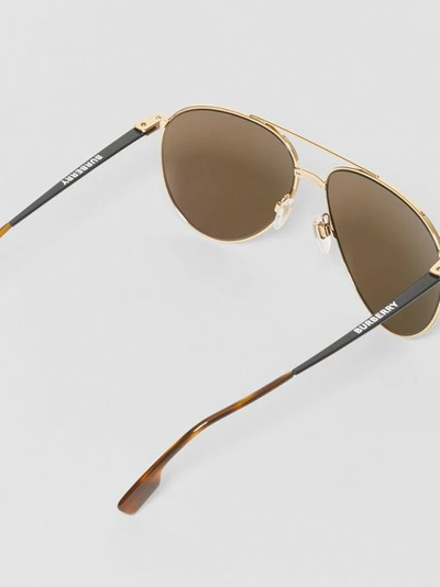 Shop Burberry Top Bar Detail Pilot Sunglasses In Gold