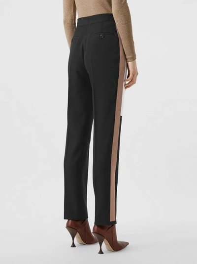 Shop Burberry Stripe Detail Wool Tailored Trousers In Black