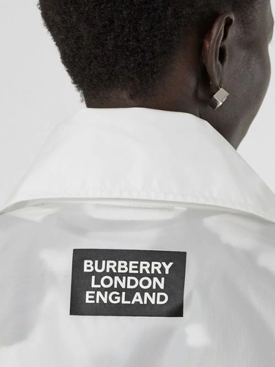 Shop Burberry Drawcord Detail Logo Print Lightweight Jacket In White