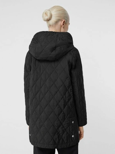 Shop Burberry Diamond Quilted Thermoregulated Hooded Coat In Black